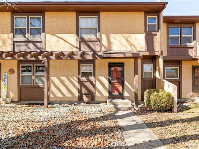 multi unit property featuring stucco siding