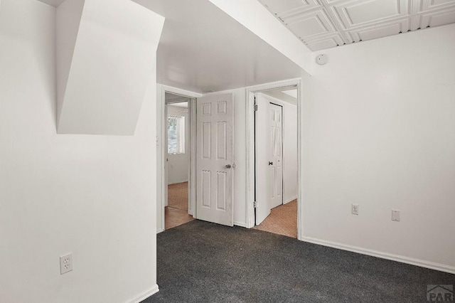 228 S Caddoa Dr, Pueblo West, CO 81007 - carpeted empty room featuring baseboards and a smoke detector