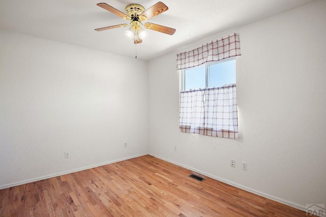 228 S Caddoa Dr, Pueblo West, CO 81007 - empty room featuring wood finished floors, baseboards, and ceiling fan