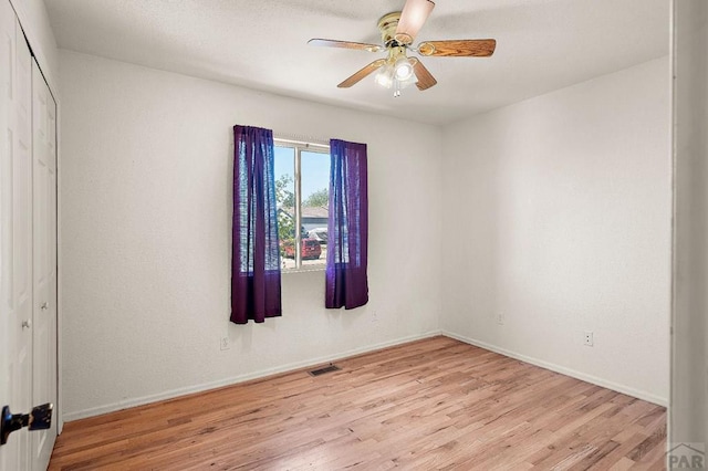 228 S Caddoa Dr, Pueblo West, CO 81007 - spare room featuring light wood-style flooring, ceiling fan, and baseboards