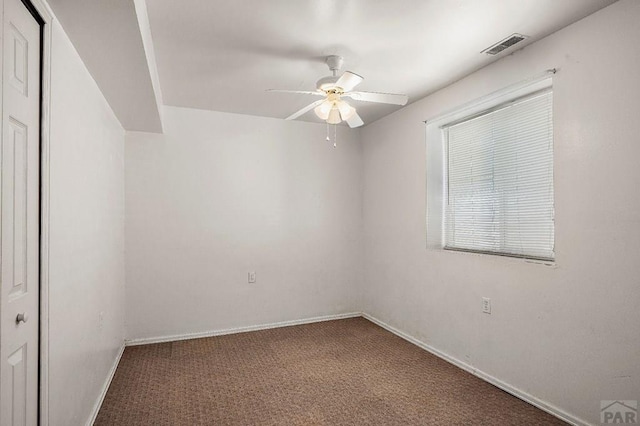 228 S Caddoa Dr, Pueblo West, CO 81007 - unfurnished room featuring ceiling fan, carpet flooring, and baseboards