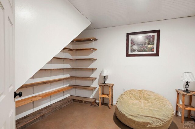 228 S Caddoa Dr, Pueblo West, CO 81007 - living area featuring finished concrete floors and baseboards