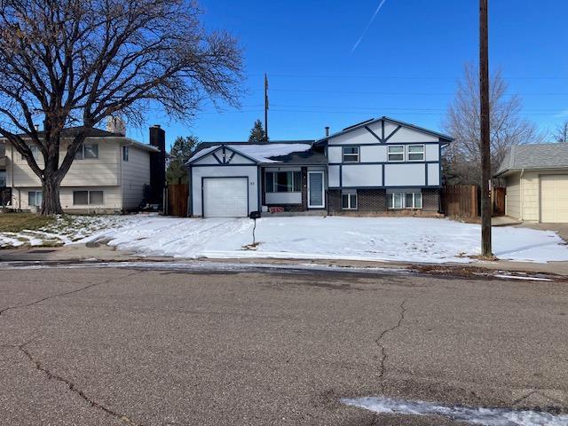 split level home with a garage