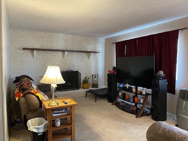 carpeted living area with a textured ceiling and brick wall