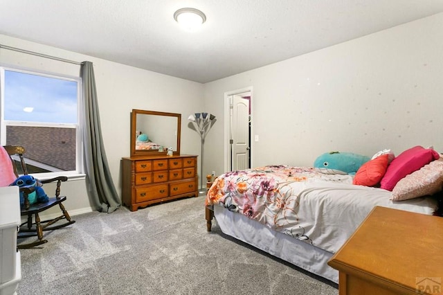 6740 Spruce Hill Ct, Colorado Springs, CO 80923 - bedroom with carpet floors and baseboards