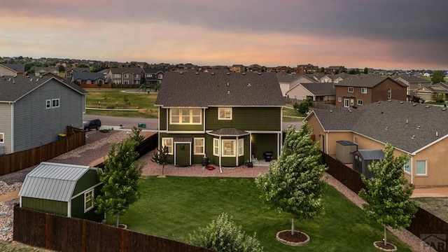 6740 Spruce Hill Ct, Colorado Springs, CO 80923 - back of house featuring a residential view and a fenced backyard