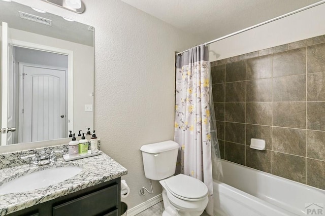 6740 Spruce Hill Ct, Colorado Springs, CO 80923 - bathroom featuring vanity, a textured wall, and shower / bathtub combination with curtain