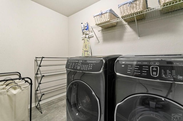 6740 Spruce Hill Ct, Colorado Springs, CO 80923 - washroom featuring washing machine and dryer and baseboards