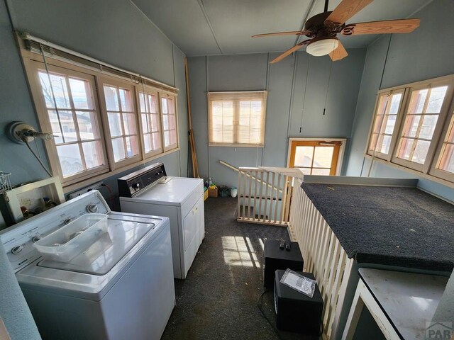 clothes washing area with laundry area, ceiling fan, and separate washer and dryer