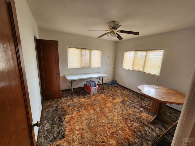 office area featuring a ceiling fan