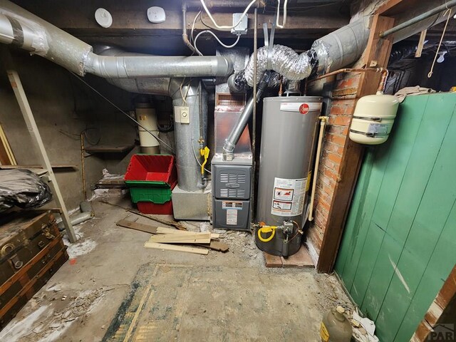 utility room with water heater