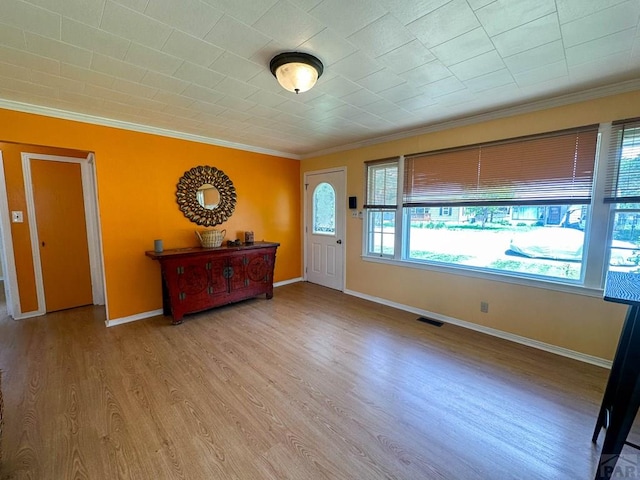 620 S 7th St, Springfield, CO 81073 - foyer featuring crown molding and wood finished floors