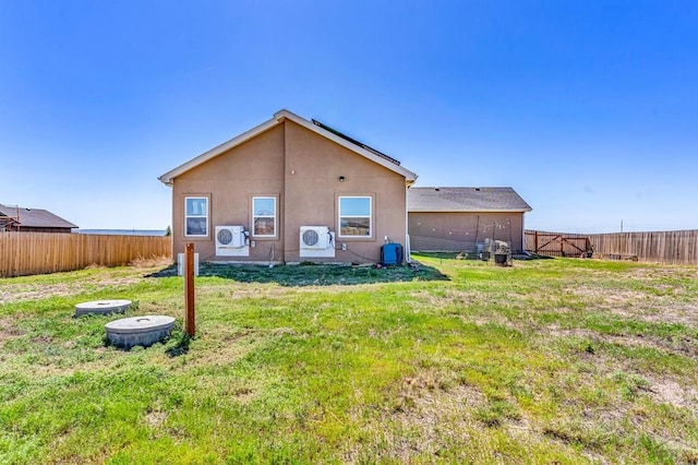 1437 Chuckwagon Ln, Pueblo West, CO 81007 - rear view of house with a cooling unit and stucco siding