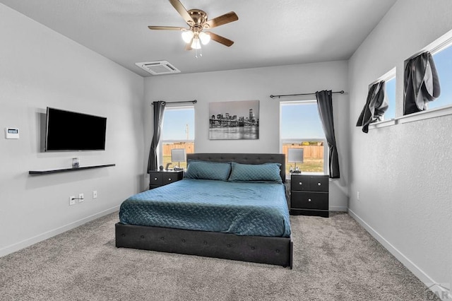1437 Chuckwagon Ln, Pueblo West, CO 81007 - carpeted bedroom featuring baseboards and a ceiling fan