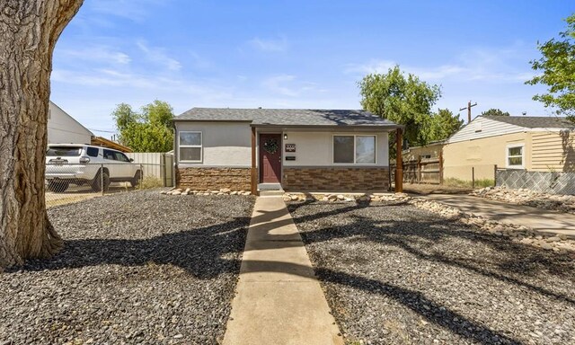 3009 Baystate Ave, Pueblo, CO 81005 - bungalow-style house with stone siding and stucco siding