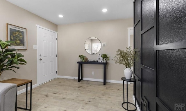 3009 Baystate Ave, Pueblo, CO 81005 - entryway featuring light wood-type flooring, baseboards, and recessed lighting
