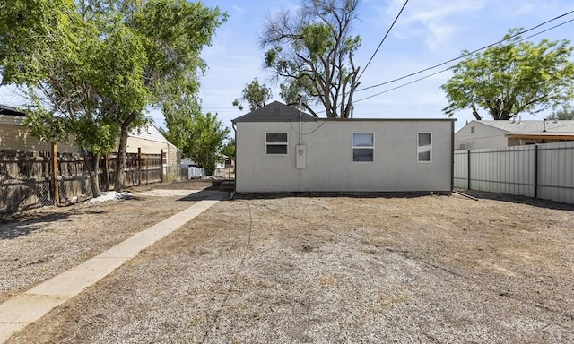 3009 Baystate Ave, Pueblo, CO 81005 - rear view of house featuring a fenced backyard