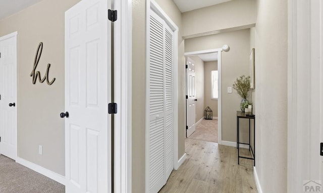 3009 Baystate Ave, Pueblo, CO 81005 - hallway with baseboards and light wood-style flooring