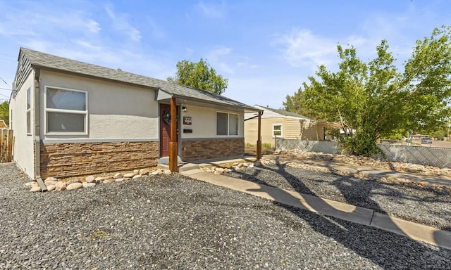 3009 Baystate Ave, Pueblo, CO 81005 - rear view of house with stone siding and stucco siding