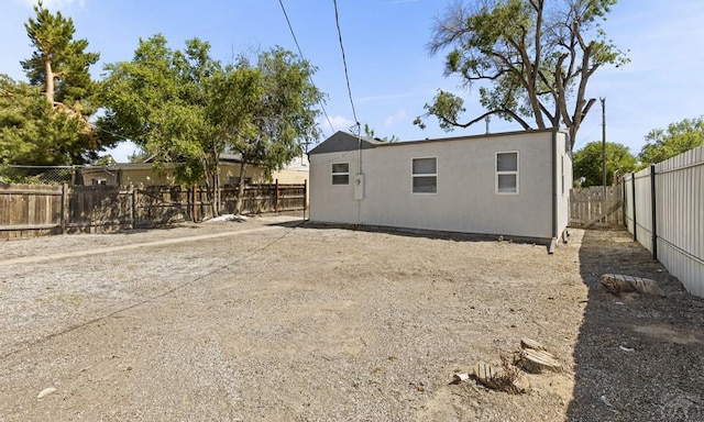 3009 Baystate Ave, Pueblo, CO 81005 - rear view of house featuring a fenced backyard and stucco siding