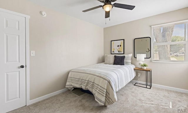 3009 Baystate Ave, Pueblo, CO 81005 - bedroom with carpet flooring, baseboards, and ceiling fan
