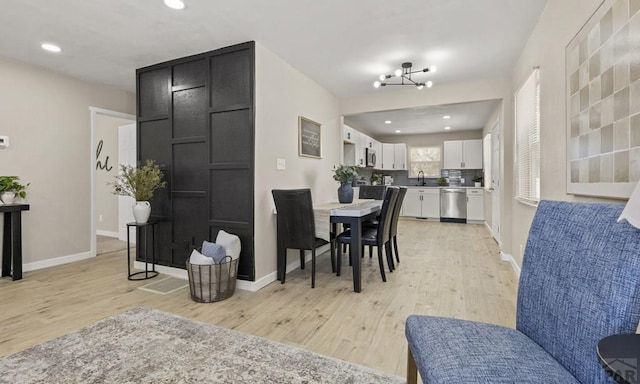 3009 Baystate Ave, Pueblo, CO 81005 - dining area featuring light wood-style flooring, baseboards, and recessed lighting
