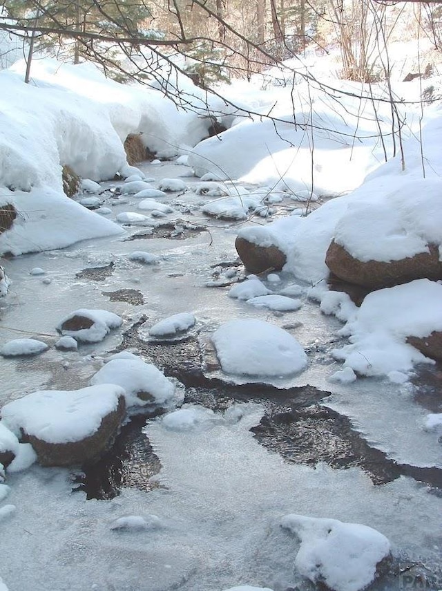 view of snow covered land