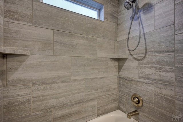 room details featuring bathtub / shower combination