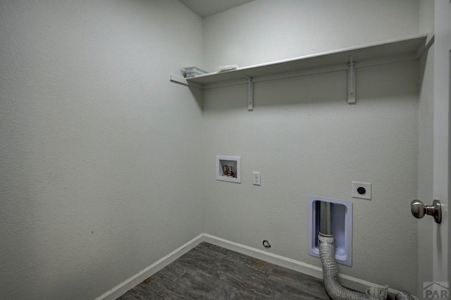 laundry room with washer hookup, hookup for an electric dryer, gas dryer hookup, laundry area, and baseboards