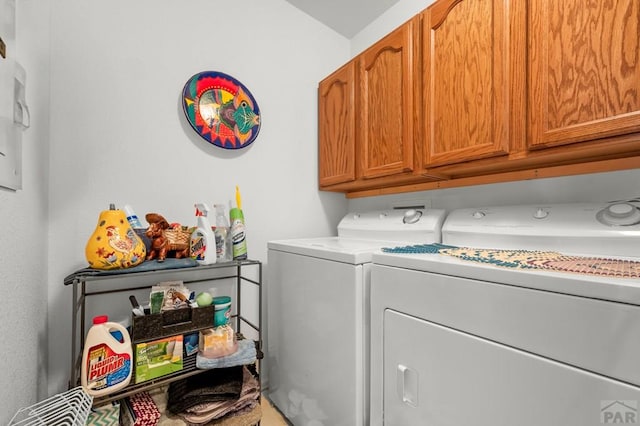 2106 Chatalet Ln Unit I, Pueblo, CO 81005 - laundry room with cabinet space and washing machine and clothes dryer