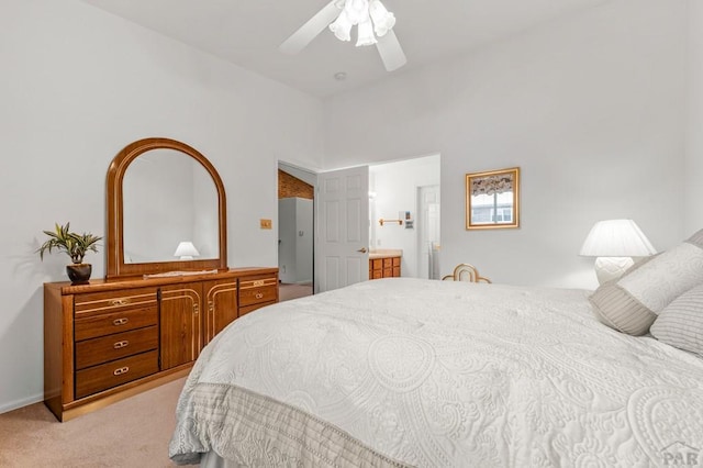 2106 Chatalet Ln Unit I, Pueblo, CO 81005 - bedroom with carpet, ceiling fan, and connected bathroom