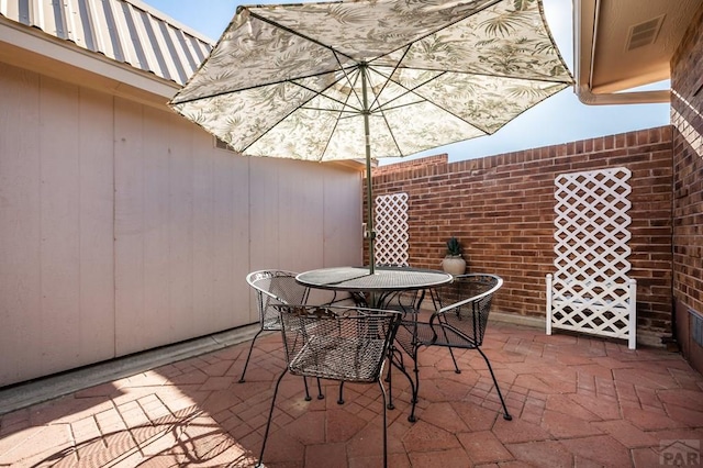 2106 Chatalet Ln Unit I, Pueblo, CO 81005 - view of patio / terrace with outdoor dining space