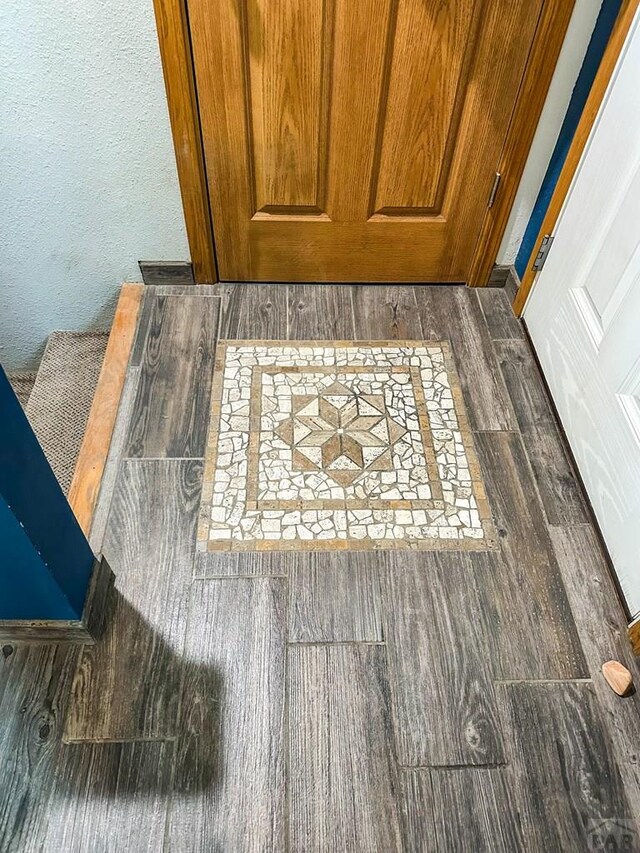 interior details featuring wood finished floors