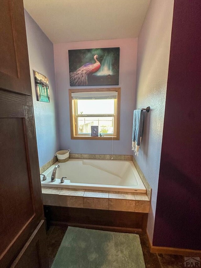 full bathroom featuring a garden tub