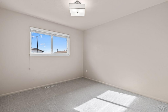 3216 Baltimore Ave, Pueblo, CO 81008 - carpeted spare room featuring baseboards