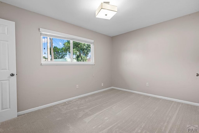 3216 Baltimore Ave, Pueblo, CO 81008 - unfurnished room with carpet and baseboards