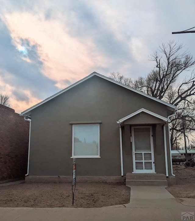 view of front of home with stucco siding