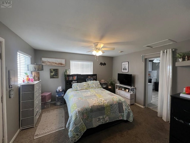 726 Morrison Ave, Pueblo, CO 81005 - carpeted bedroom with multiple windows, a ceiling fan, and baseboards