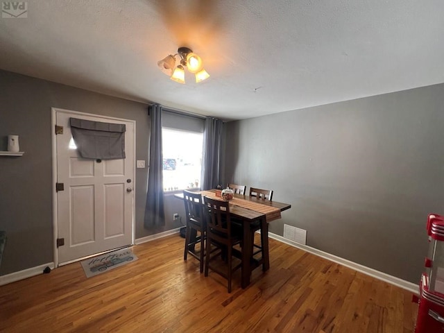 726 Morrison Ave, Pueblo, CO 81005 - dining area featuring wood finished floors and baseboards