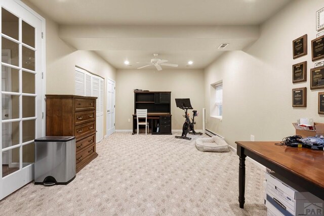 office space with recessed lighting, baseboards, a ceiling fan, and light colored carpet