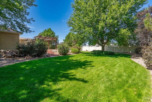 view of yard featuring fence