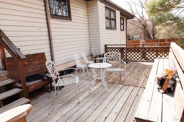 wooden deck featuring fence