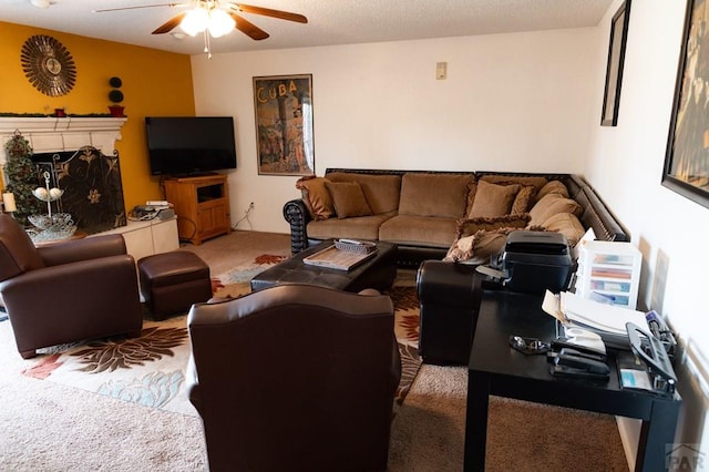 carpeted living area featuring ceiling fan