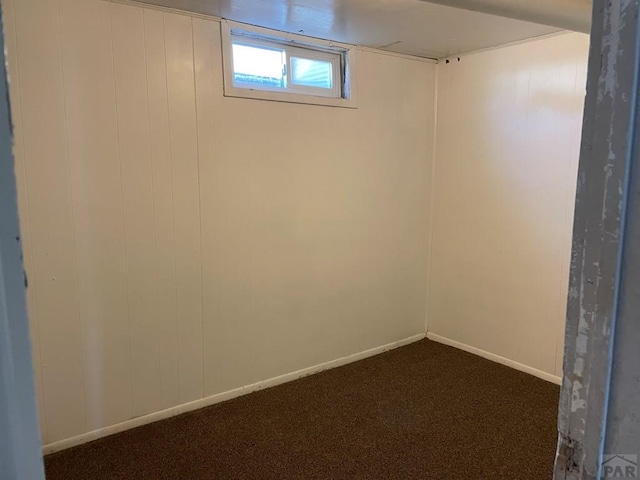 1540 E 13th St, Pueblo, CO 81001 - basement featuring dark carpet and baseboards