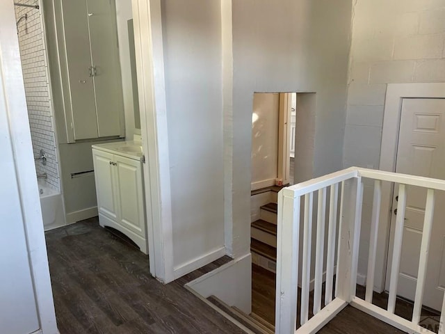 1540 E 13th St, Pueblo, CO 81001 - hallway featuring dark wood-style flooring