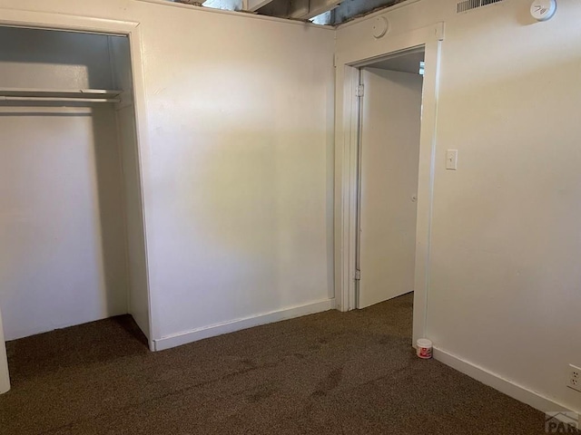 1540 E 13th St, Pueblo, CO 81001 - unfurnished bedroom featuring carpet floors and a closet
