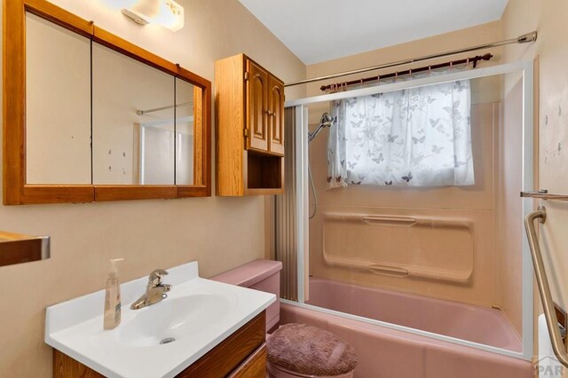 full bath featuring toilet, shower / washtub combination, and vanity