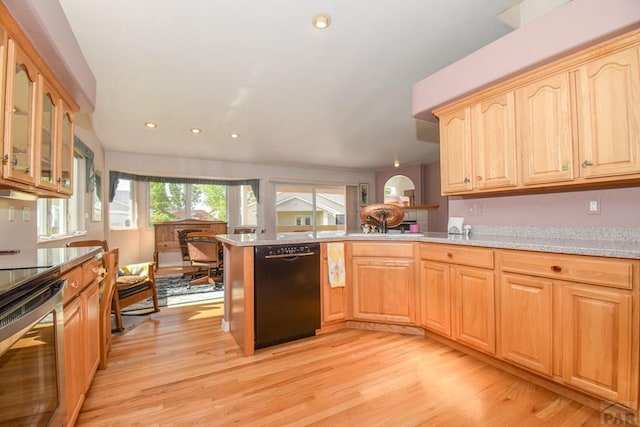kitchen featuring dishwasher, a peninsula, light wood-type flooring, stainless steel electric stove, and recessed lighting