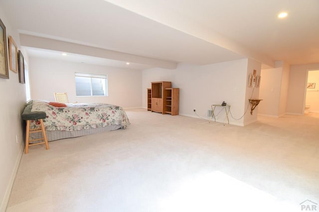 carpeted bedroom featuring recessed lighting and baseboards