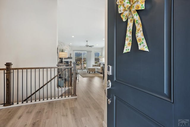 16840 New Autum Dr, Monument, CO 80132 - entrance foyer with wood finished floors, a ceiling fan, and recessed lighting